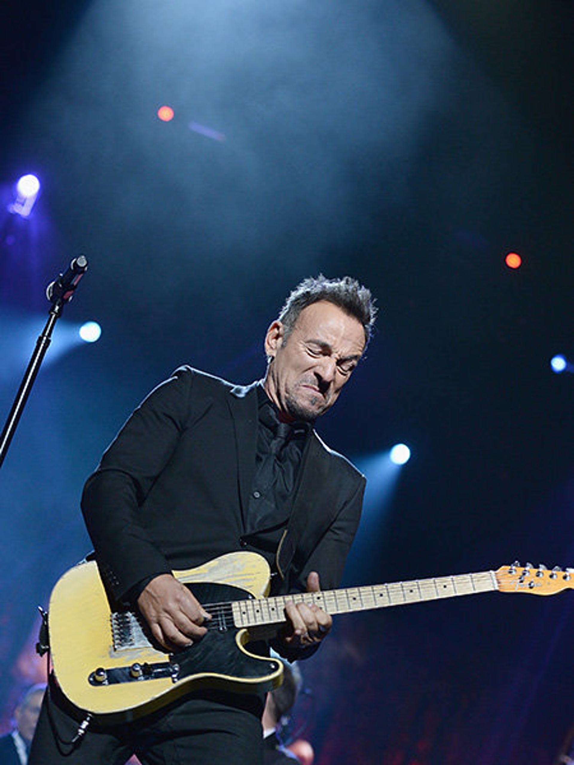 funny-guitar-playing-faces-bruce-springsteen-billboard-450